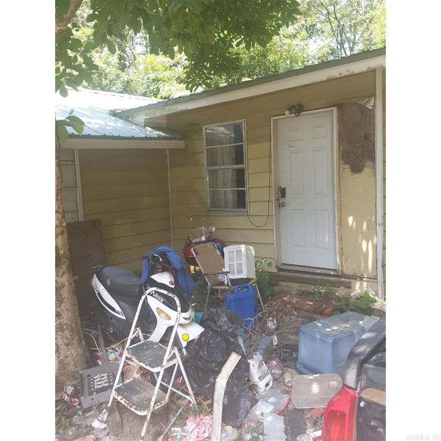 Discover a great investment opportunity in the heart of Benton! This 2-bedroom, 1-bath home sits on over half an acre and offers plenty of potential for those ready to bring it back to life. The home is being sold as-is, making it perfect for investors, flippers, or anyone looking for a project.  With a spacious lot, mature trees, and a convenient location nearshopping, and dining, this property provides both privacy and accessibility. Whether you’re looking to renovate and resell or create a long