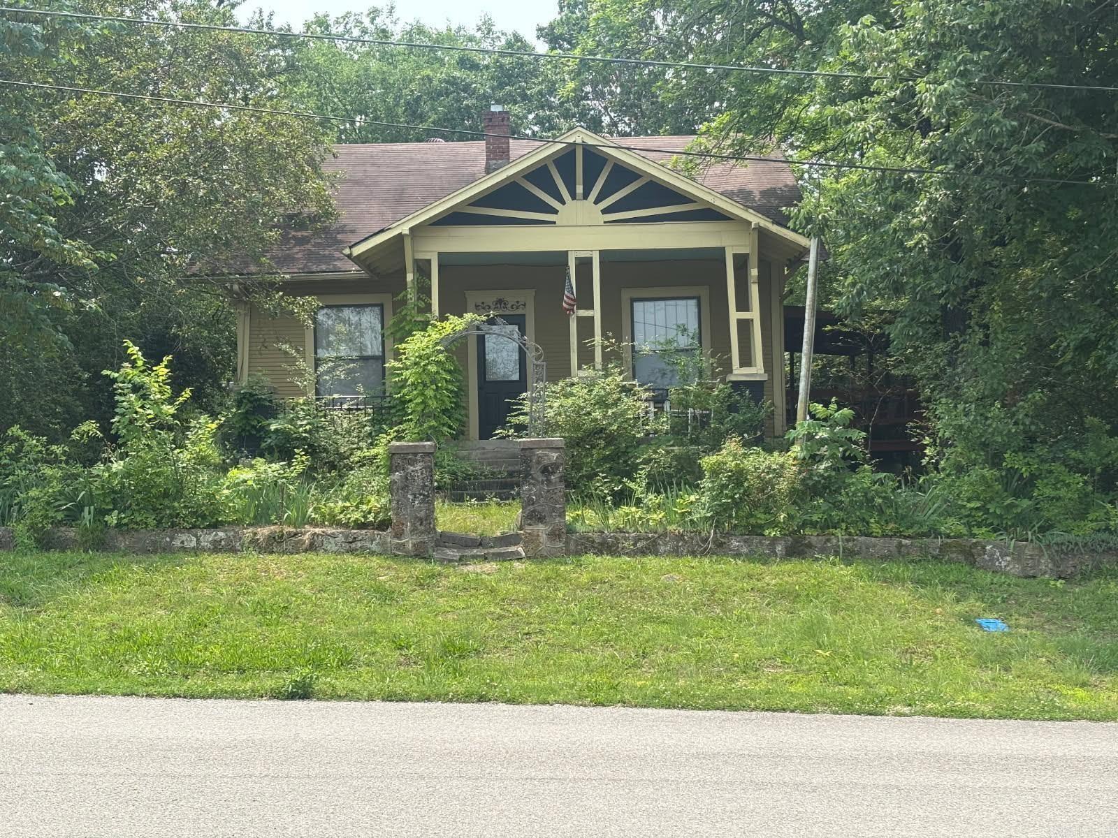 Welcome to Market 306 Second St in Calico Rock, AR! This timeless property has many features including a large bathroom that includes a fireplace & standing bathtub. It also has a large laundry room that has a root cellar below. The picturesque kitchen has a small island & pan hanging rack. Wood burning stove in living room. Refrigerator, washer & dryer to remain! All furniture remaining inside home to remain as well. Small shop in back has electricity. Home to be sold AS IS. Call you favorite Realtor for your tour!