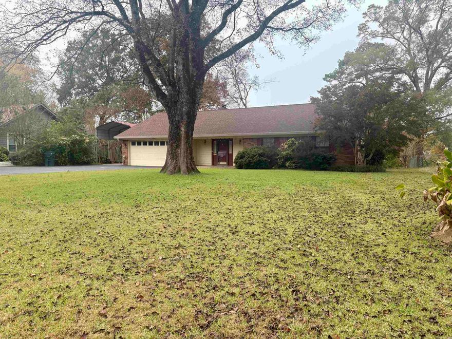 Welcome to your serene lakefront retreat in the prestigious Caroline Acres subdivision. This brick ranch home offers the ultimate in convenience and recreation. Perfect for boaters, lake lovers and anyone wanting the lake lifestyle with beautiful views with 100 feet of lake frontage and only minutes from shopping, dining and marinas. All on one level allowing for smooth barrier free living and easy accessibility. Step into a bright and open great room anchored with a fireplace and windows that frame the lake view. Enjoy direct lake access with a covered boat dock (new roof) and swim dock where you can relax, swim or just enjoy the sunset. An outdoor storage building offers a space for your tools, yard gear or lake toys. Long paved drive with extra covered parking to facilitate boat trailers or guests.