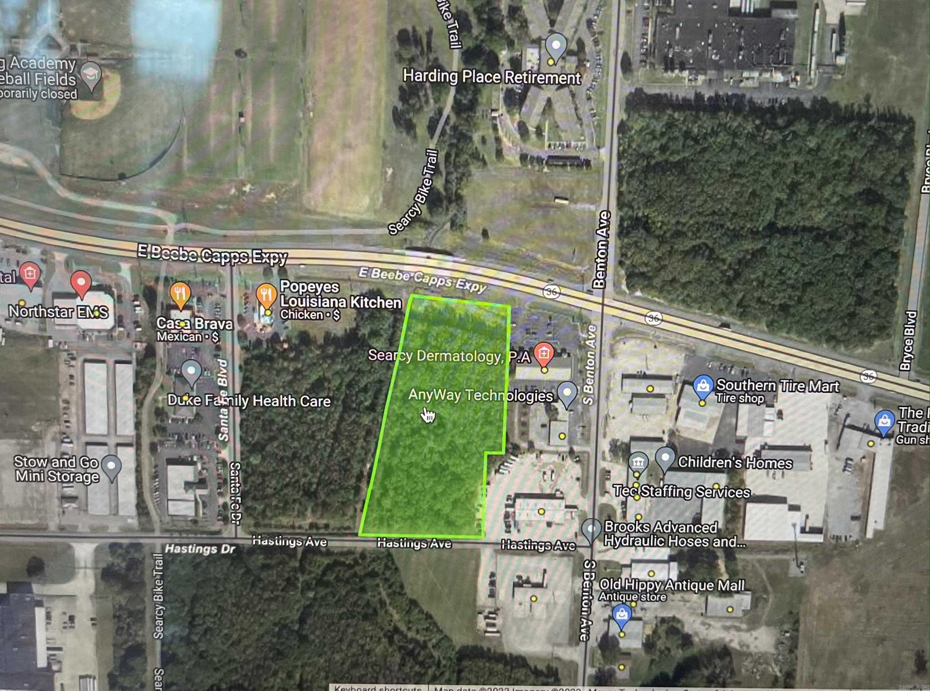 PRIME 5.6 acres of developmental commercial property, frontage, very high traffic count. Located next to Beebe Capps Professional Bldg and Hometown Orthodontics and directly across the highway from Harding University