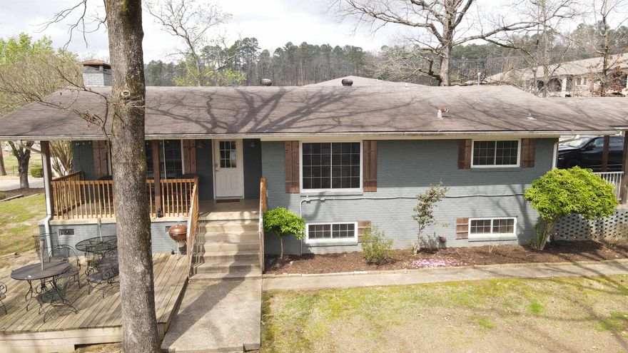 Lakefront Living! Renovated 2019, this home sits in a cul-de-sac with a picturesque views of Lake Hamilton whether dining inside, sitting on back porch, deck or boardwalk. Beautiful wood floors, quartz countertops, tankless water heater, and more. 2 bedrooms and bath upstairs, bunkroom and bath downstairs. Furniture and appliances convey.  So, whether you are looking for a residence on the lake or well-established vacation rental property, this home is conveniently located minutes from Oaklawn and all the amenities Hot Springs has to offer.