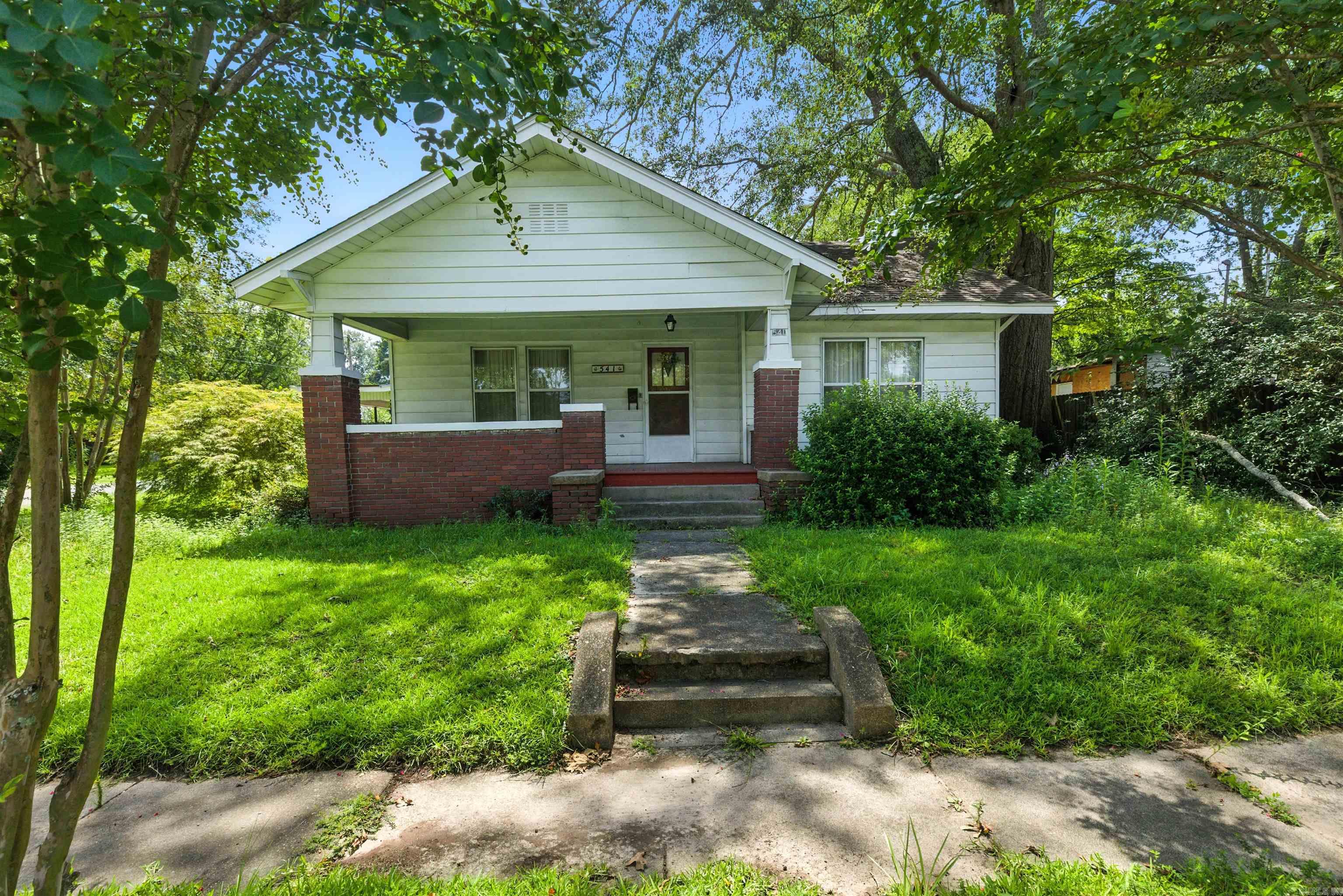AGENTS....Please read agent remarks prior to showing the home. This 3 bed, 1 bath, home has plenty of charm. It boasts original hard wood floors, high ceilings, spacious eat in kitchen, huge covered patio, work shop with electricity that used to be a detached garage. Home rests on a corner lot with mature crepe myrtle trees. HVAC 2011. Square footage is approximate. Measuring is encouraged!