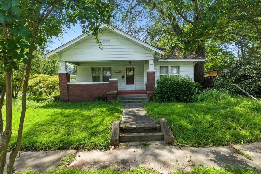 AGENTS....Please read agent remarks prior to showing the home.    This 3 bed, 1 bath, home has plenty of charm.  It boasts original hard wood floors, high ceilings, spacious eat in kitchen, huge covered patio, work shop with electricity that used to be a detached garage. Home rests on a corner lot with mature crepe myrtle trees. HVAC 2011. Square footage is approximate.  Measuring is encouraged!