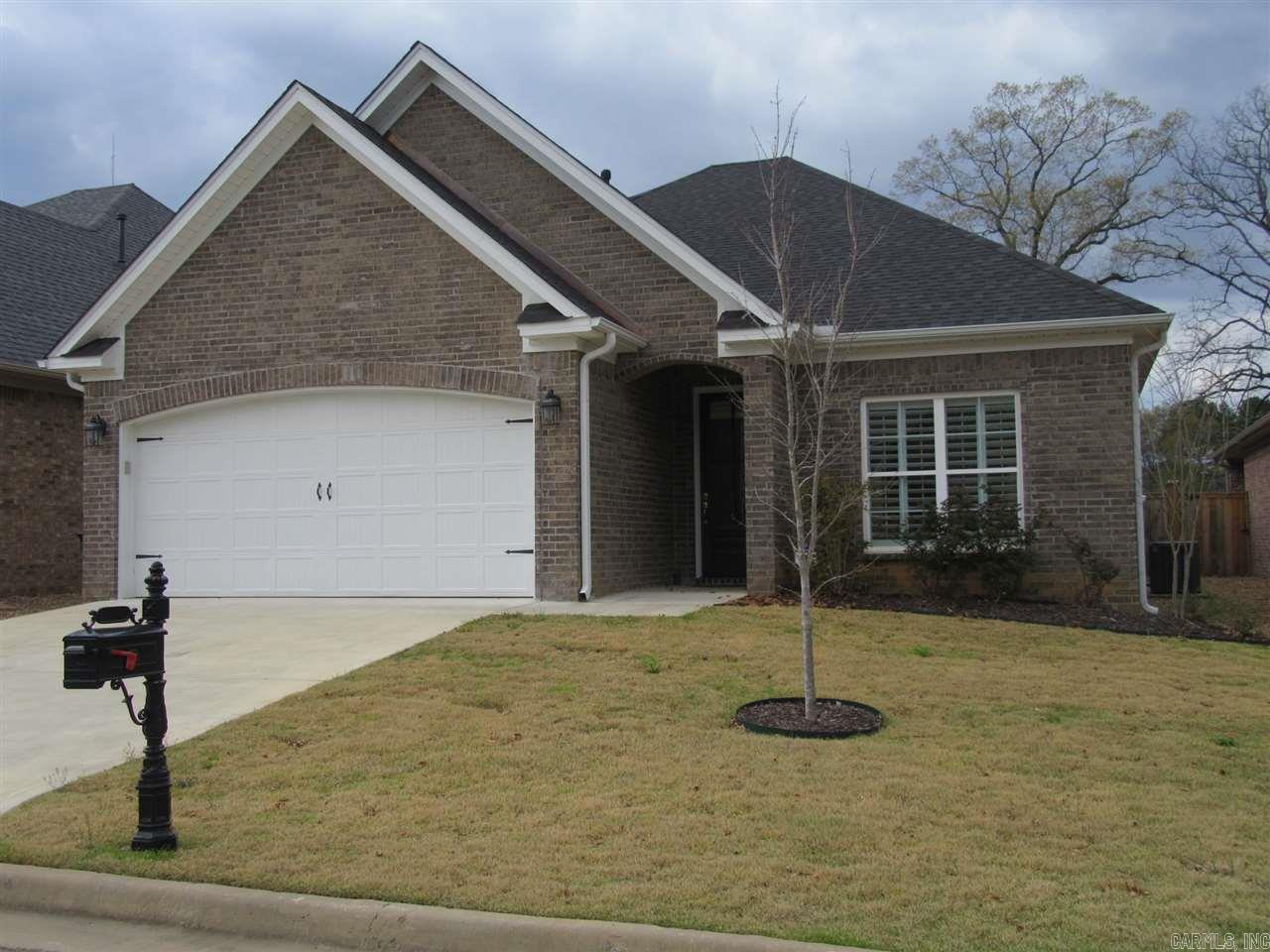 Luxury Patio home built by Parkinson- quality abounds! One level, all brick, hardwood floors throughout. Open floor plan w/ kitchen, den, & eating area combined. Oversized breakfast bar. Kitchen, laundry and baths have granite. Upgrades include custom shutters, tankless HWH, 5 burner gas cooktop, can lighting and hardwoods in bedrooms/closets. Split master w/large closet and tile shower. Mudroom and laundry room built-ins. Large covered patio- fully sprinklered. Modern grey color scheme. Like NEW.