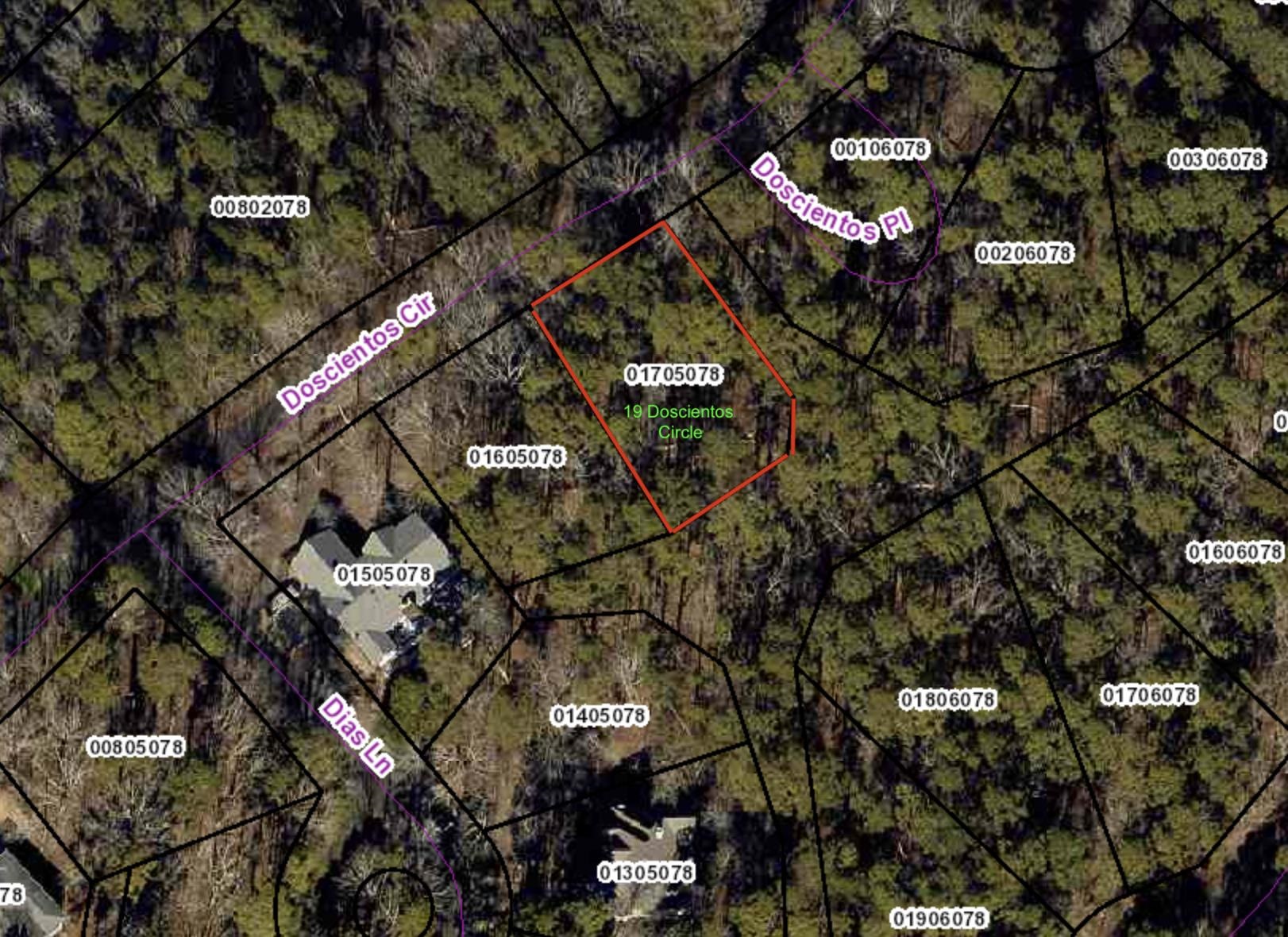 Wooded lot a short distance from the Cortez golf course. Located on a hill in a quiet neighborhood.