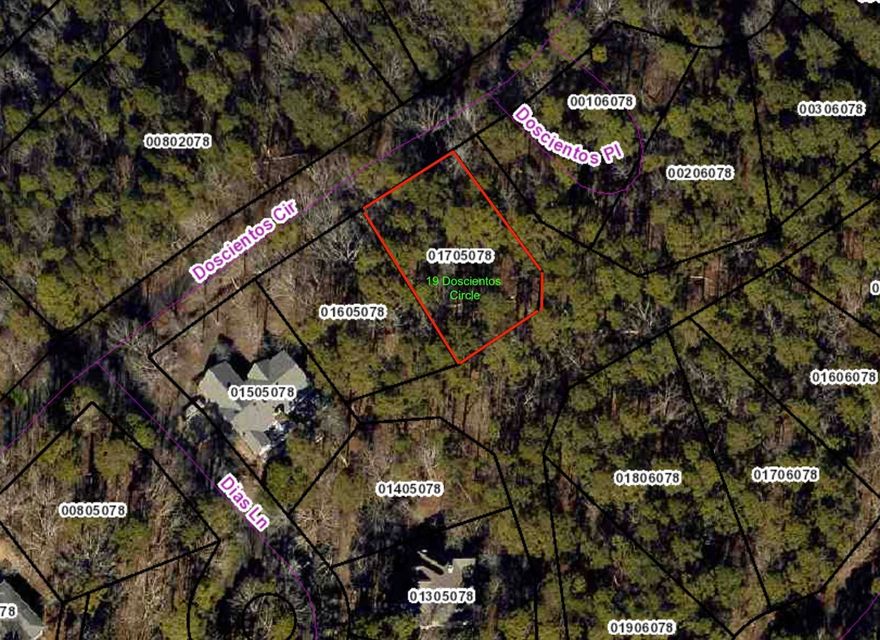 Wooded lot a short distance from the Cortez golf course. Located on a hill in a quiet neighborhood.