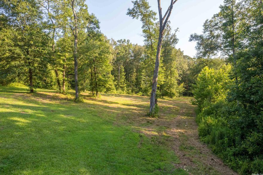 Nice property to build your dream home! This parcel includes 2.87 acres and a creek! Truly the best of both worlds! Country living outside of the city limits with hills and woods to provide privacy but also conveniently located near Benton. Water, gas, electric available at Squires Road. Hurry! Before it's gone!