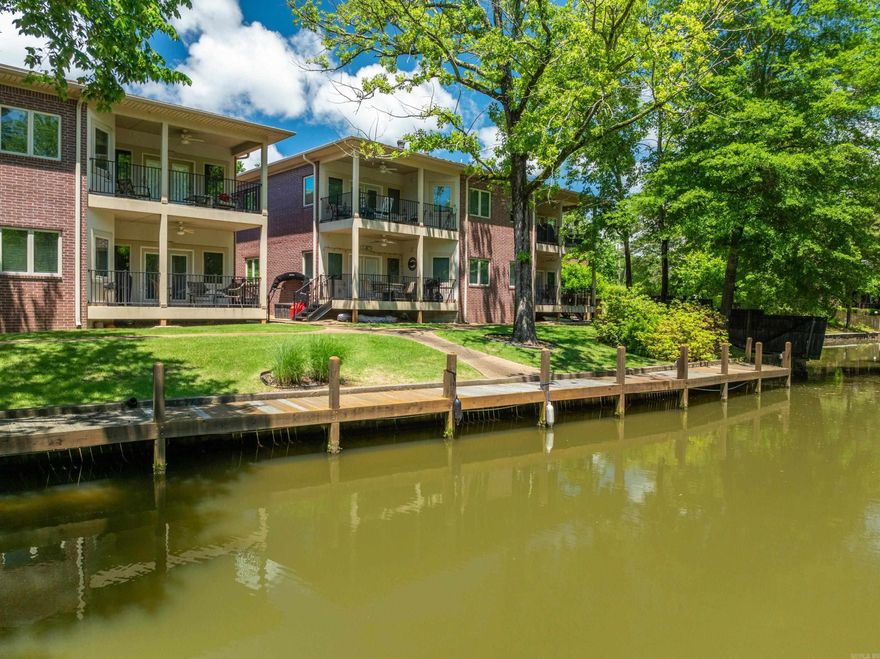 Experience the best of lake living in this beautifully maintained lakefront condo on Lake Hamilton. Featuring stylish modern updates throughout, this inviting retreat offers the perfect blend of comfort, convenience, and tranquility.  Nestled in a peaceful and private setting with low boat traffic, you’ll enjoy relaxing waterfront views without the noise and congestion. The well-kept interior showcases contemporary finishes, creating a move-in-ready space ideal for weekend getaways or full-time living.  Located just minutes from popular restaurants, shopping, and local attractions, this condo delivers the perfect balance of seclusion and accessibility. Residents will also enjoy great amenities such as a private boat ramp, on-site pool, and low POA dues — making lake life both easy and affordable.