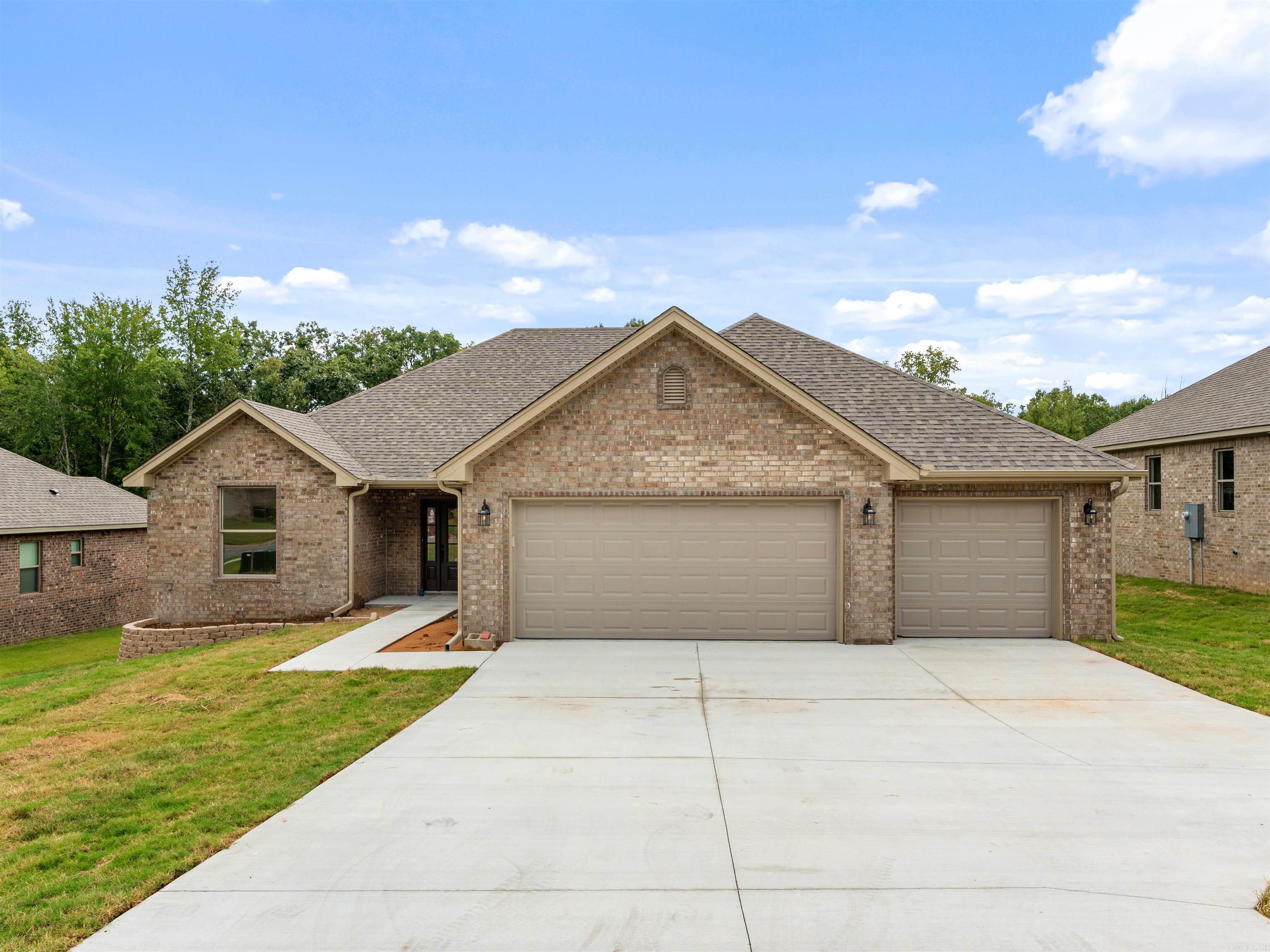 New construction in the heart of Sherwood! Just a few of the features you'll enjoy: 3 car garage- open floor plan- fireplace w/ gas starter- granite tops in all wet areas- kitchen w/ ss appliances, granite tops w/ tile backsplash and pantry- built-in desk- primary bath w/ large tile shower and garden tub- large walk-in closet leading to laundry area- covered oversized deck and large backyard w/ greenspace behind! Call us if you'd like to see the floorplan.
