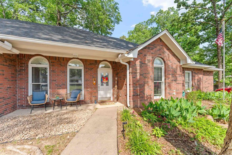 This is a beautiful 4 bed, 3 bath home tucked on a quiet cul-de-sac in Maumelle. Here, you’re just minutes from outdoor favorites like Lake Willastein Park, Lake Valencia Park, and miles of scenic hiking trails—perfect for enjoying the outdoors while staying close to everything. Conveniently located between Little Rock and North Little Rock, you’ll have quick access anywhere in Central Arkansas.  At the entry, a flexible office sits to the left with fresh paint and updated fixtures, while a formal dining room to the right features decorative molding and updated lighting.  The kitchen offers stone countertops, tile backsplash, custom cabinetry with rollouts, farmhouse sink, stainless appliances, and a double oven. A bright eat-in area with bay windows and French doors fills the space with natural light.  The main living area features tall ceilings, a wood-burning fireplace, and large windows overlooking the backyard.  The primary suite includes bay windows and a renovated en-suite with a custom shower. Two additional bedrooms plus a guest suite provide plenty of space.  Enjoy an oversized backyard with a deck, built-in seating, garden area, shed, plus RV access and hookups.