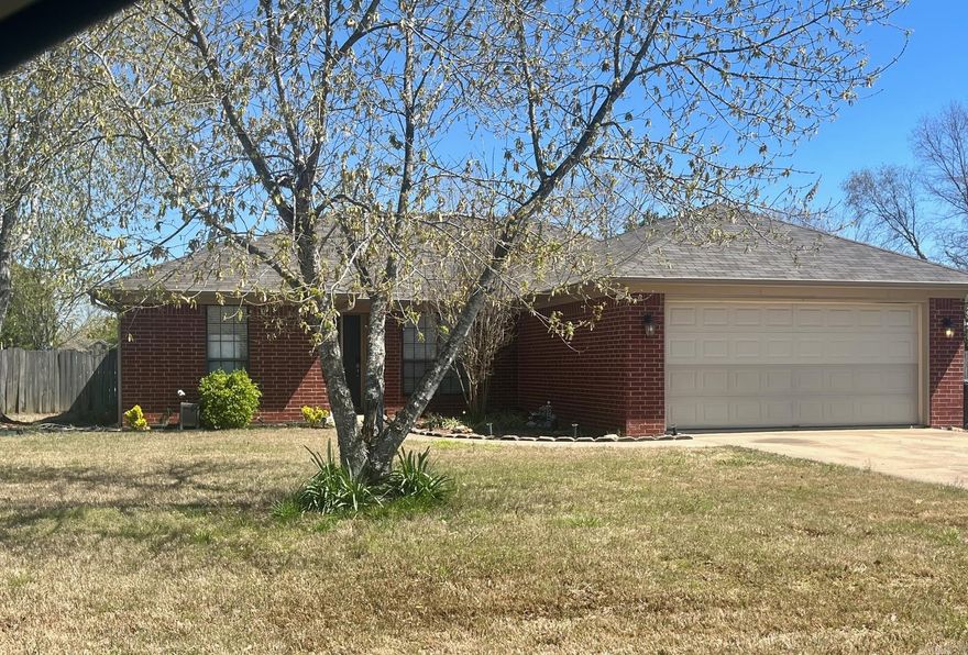 Beautiful 3 Bedroom/ 2 Bath home with fenced back yard in established neighborhood.  This home has wood and tile floors.