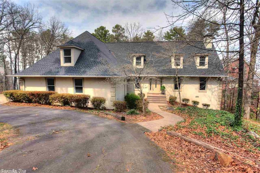 Look out at Lake Beaverfork from your own deck and private boat dock. 131 feet of lake frontage with a gentle slope to the lake. Sunken master bedroom is on main floor with French doors onto the deck and with built in bookcases. Two large bedrooms upstairs with large bath. Upstairs and downstairs A/C unit replaced in 2011, heat pump 2013. Roof replaced in 2012 and most appliances replaced in 2011 and 2012. Pontoon boat is negotiable and also willing to sell existing furniture and extra refrigerator.