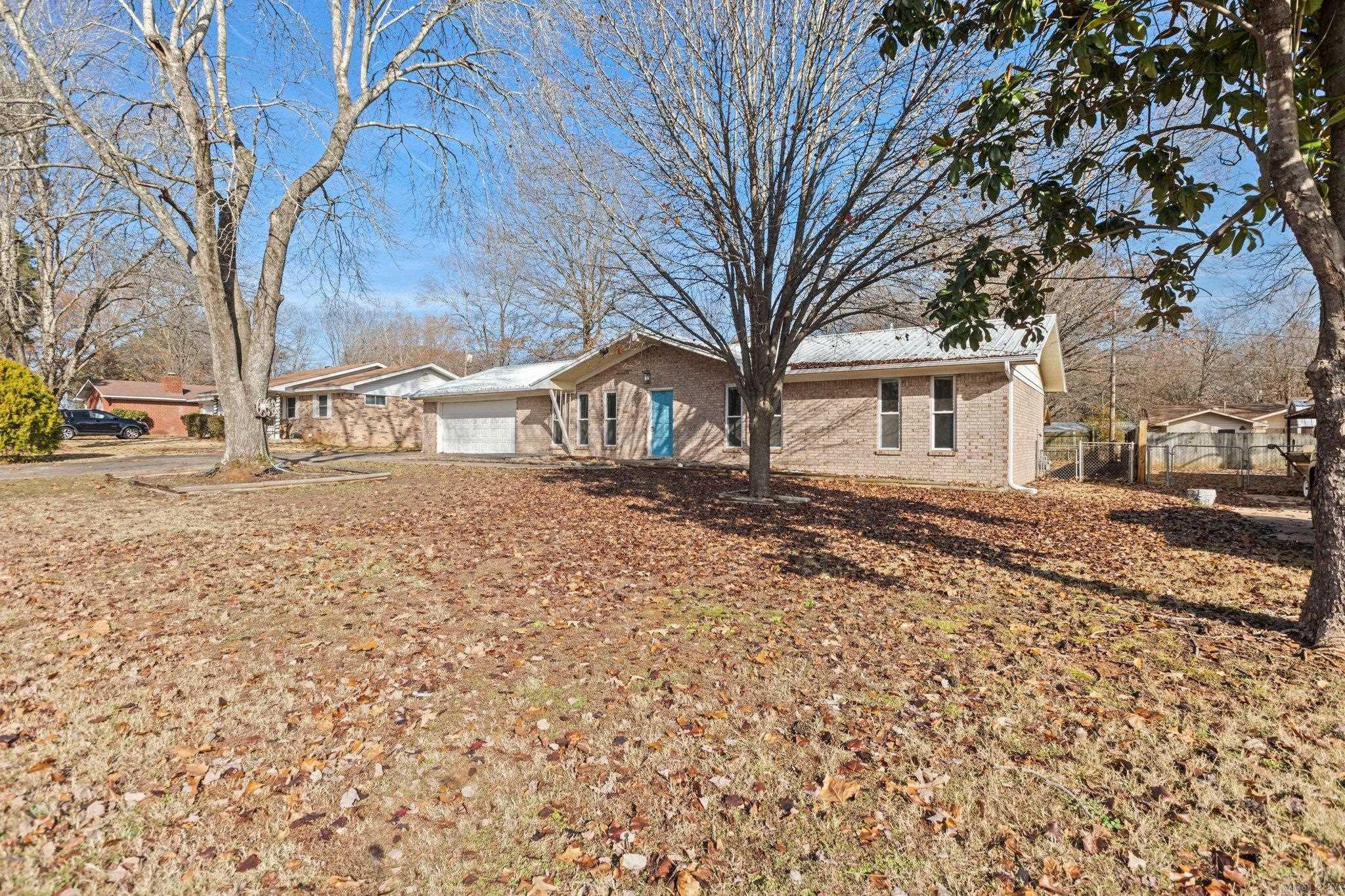 Great home in a great neighborhood! This 3 bedroom, 2 bathroom gem offers 1701 square feet of comfortable living space and plenty of potential to make it your own. The home is all-brick, equipped with a metal roof, and 2 car garage with extended driveway leading to additional detached garage for hobbies, tools, or extra storage needs. Recent updates in 2024 include a brand-new HVAC system, ceiling fans and door hardware, gutters, and fresh carpet in all bedrooms. Other improvements in recent years include updated windows and a newer water heater, ensuring key features are already in place. While the home could use some TLC and your own finishing touches, it's an incredible opportunity to create the space you've always envisioned. Conveniently located near schools, shopping and local amenities, this property is a must see. Schedule your tour today and explore the possibilities.