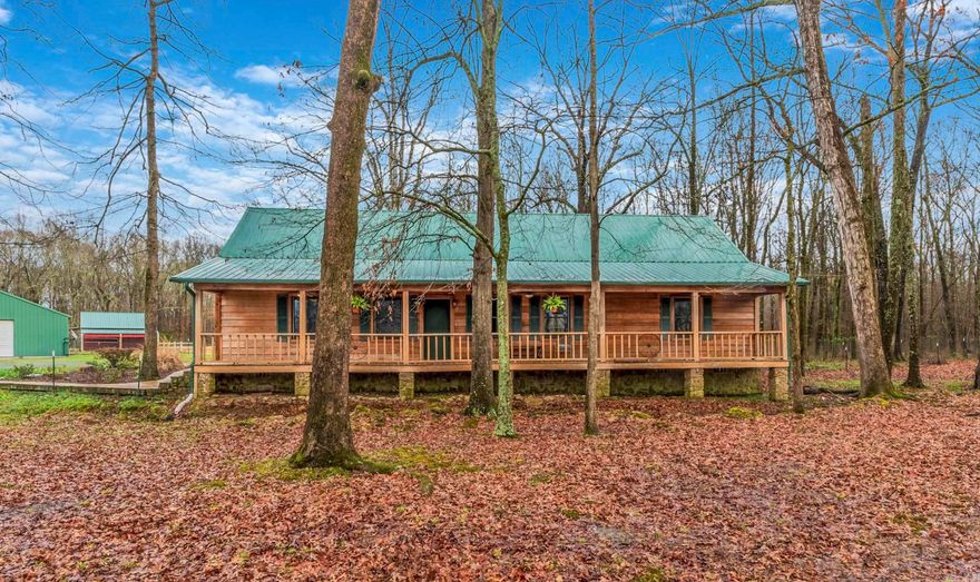 Welcome to your dream rustic country retreat! Nestled within almost 2.5 acres of lush, fully fenced grounds, this captivating ranch-style home exudes southern charm and tranquility, all just moments away from town. The property features a spacious barn, perfect for housing livestock or storing equipment, while a large shop (approx. 30x40) offers ample space for hobbies or work projects. The quaint hen house provides a delightful touch of farm life. Ideal for animal lovers or those craving a spacious and serene country lifestyle! Two creeks run on the property. Imagine relaxing on the beautiful front porch sipping your morning coffee before tending to the animals. You do not want to miss your opportunity to buy this property! Brand new stove in kitchen! Upstairs attic space is plumbed and could easily be converted into another bedroom and bathroom. So much natural light and storage throughout! Do not forget to check out the master bathroom bathtub, it is the cherry on top! Laundry area is great! Hot water heater replaced 2023. Both the shop and barn have water. Fresh paint throughout the home! Fireplace condition unknown. Agents see remarks