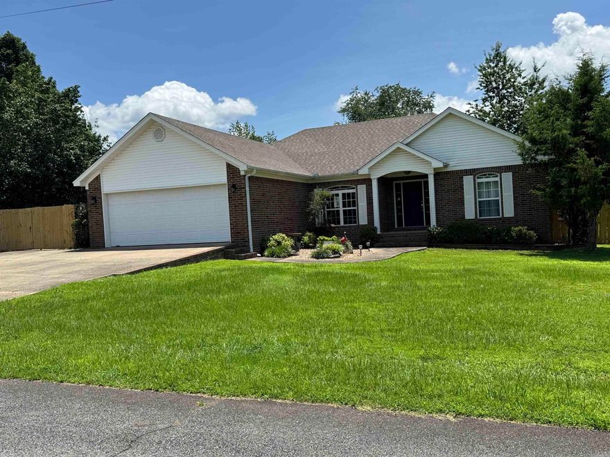 3 bedroom, 2 bath brick home in the middle of beautiful Greers Ferry. This property has paved road with concrete drive, completely privacy fenced, 10 x 16 storm shelter and a 40 x40 shop. The shop has a concrete drive, 20 x 10 ft door, heated and cooled, bathroom and a storage room. The home has a large living room with a trey ceiling and a gas log fireplace. Kitchen has granite counter tops, side x side refrigerator, smooth top stove, pantry and a bay window breakfast nook that overlooks the back deck and yard. The master has a trey ceiling, walk-in closet and walk-in shower. The 2 car garage leads into the utility room with washer, dryer and sink. Roof, heat & air unit and water heater are less than 3 years old. This property is close to all the shopping, marinas, restaurants and launch ramps. Won't last long. Give us a call today.