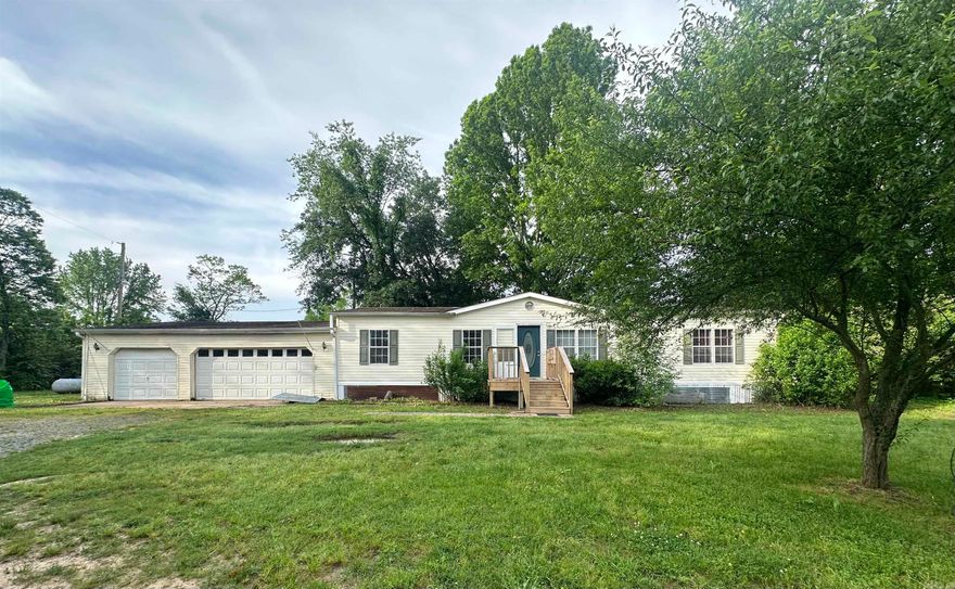 Mobile home on 3.01 acres of land. Fresh paint and new flooring.  Move in ready. There is a storage building and pond on the property also. Quiet setting close to interstate and minutes from Lonoke, Cabot and Little Rock.  This would also make a great investment property. Property to be sold as-is.