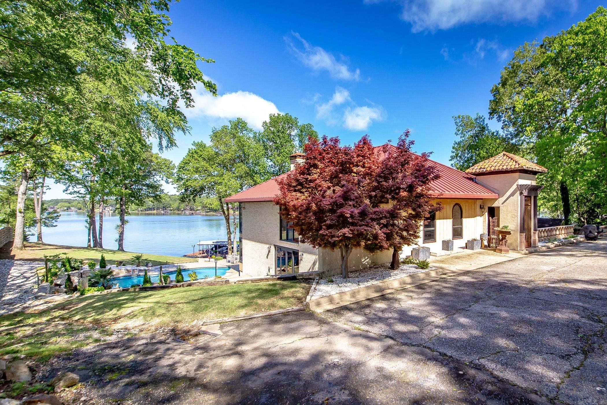 Very relaxing and oh what a view of Lake Hamilton. There is plenty of room for everyone. The patio for grilling, the pool to relax in. The tennis court to enjoy as well. This place has so much to offer. The Lion Gate is a gated venue. Great location for shopping & dining. One of Hot Springs most sought after locations.