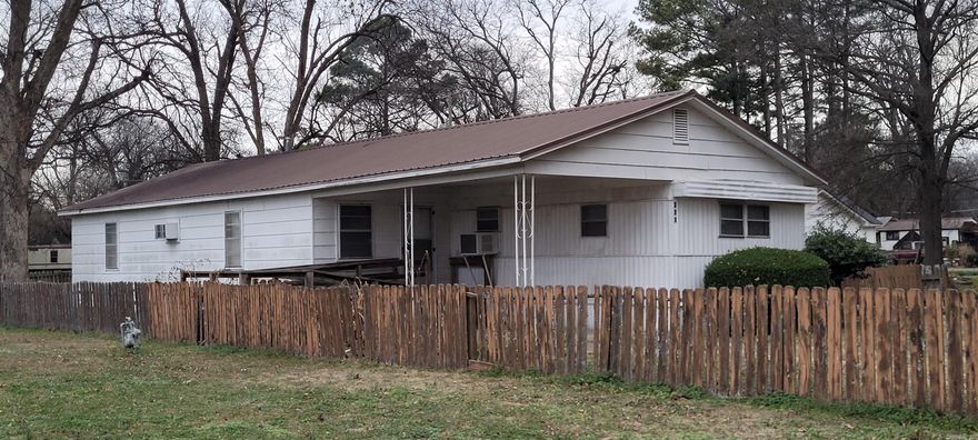 1438sqft three bedroom 2 bath single wide mobile home with addition. Metal roof. Selling AS-IS.