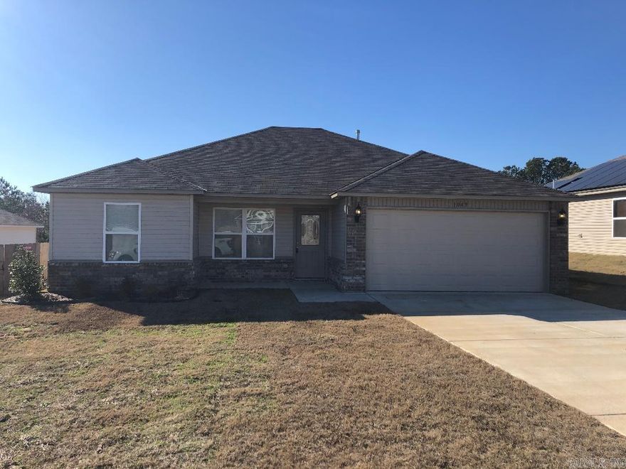 3 beds 2 baths with an open concept that features can lighting in the kitchen and a bar for entertaining. The living areas has a vaulted ceiling. Stainless steel dishwasher, microwave, refrigerator & smooth top range. Beautiful color combinations and a 2 car garage.