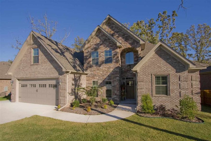 WOW!!! ABSOLUTELY GORGEOUS,VERY OPEN,VERY SPACIOUS,HIGH-END HOME! EVERY BEDRM HAS HUGE WALK-IN CLOSET & ACCESS TO BATH!STUNNING ROCK ENTRANCE,BEAUTIFUL HARDWOOD FLRS,CUSTOM CABINETRY W/TONS OF BUILT-INS INCLUDING ISLAND,PANTRY & OFFICE NOOK,2" WOOD FAUX BLINDS,SOLID GRANITE,STAINLESS APPL.-INCLUDING FRIDGE, POT-FILLER FAUCET,BUILT-IN LOCKERS IN LAUNDRY W/SINK,GRANITE COUNTERS & EXTRA CABINETS,TONS OF WINDOWS,TONS OF FLOORED ATTIC STORAGE,EXTRA HUGE DECK & OUTSIDE ATTACHED UTILITY STORAGE W/CONCRETE RAMP.