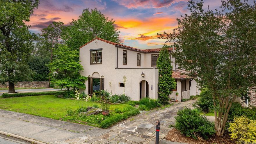 One of the most fun, architecturally pleasing homes you will see! Tons of amazing touches all throughout this updated, iconic 1926 Max Mayer home.  A large formal room with a fireplace, tall ceilings, & a gorgeous detailed front window welcomes you into the home. The updated kitchen has wonderful appliances, solid surface counter tops, double wall ovens & a large farm sink. The kitchen is open to the sunken den with beamed ceiling and a wall of back windows overlooks an exterior dining patio with fireplace. The family room has plenty of space for a casual dining table as well another fireplace. The primary suite is on the main level and has a huge closet and very nice bathroom with double vanities, walk in shower and tub. There are back stairs that take you to a 5th bedroom or office (this space has a full bath and large closet). Off of the hallway to the primary is the entrance to the walled courtyard which is perfect for pet or child play.  Also on the main level is a formal dining room and an office with a half bath.  The main upstairs has 3 bedrooms with 2 full bath.  Three of the four HVAC have been replaced since 2023.  This is an exquisite, special home!!  Come see!