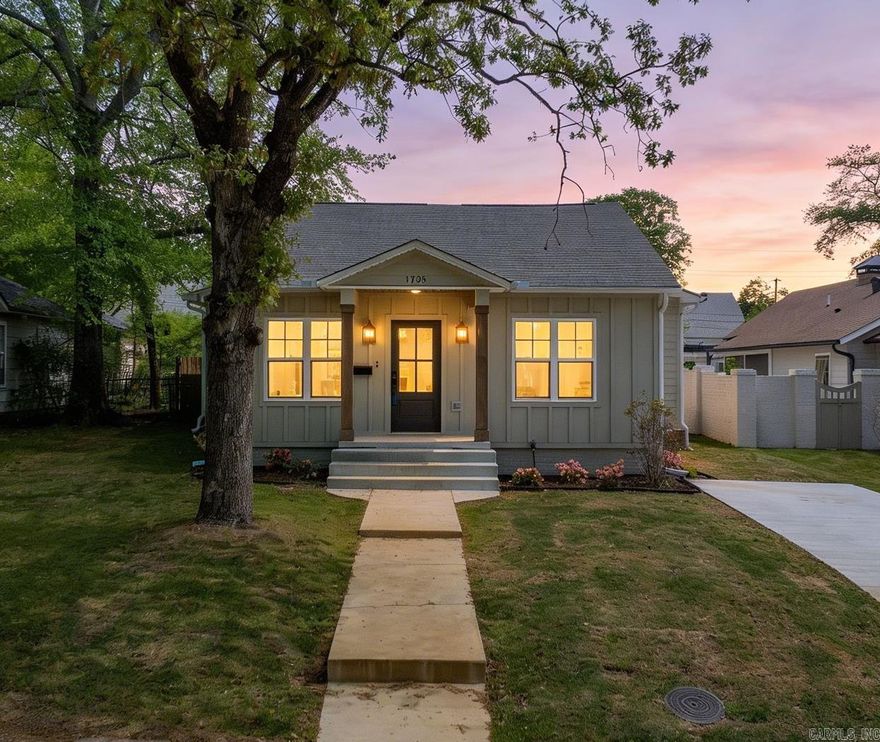 This masterfully remodeled 1935 Heights bungalow blends historic charm with modern luxury. The open-concept kitchen, den, and dining area features sleek flush-design cabinetry and dual pantries. Retreat to a lavish primary suite with a soaking tub, walk-in shower, and massive closet. Two additional bedrooms share a Jack and Jill bath, plus a guest half-bath. Includes a rear-load 2-car carport, built-in lockers, and a covered back porch overlooking a flat backyard. A turnkey treasure.
