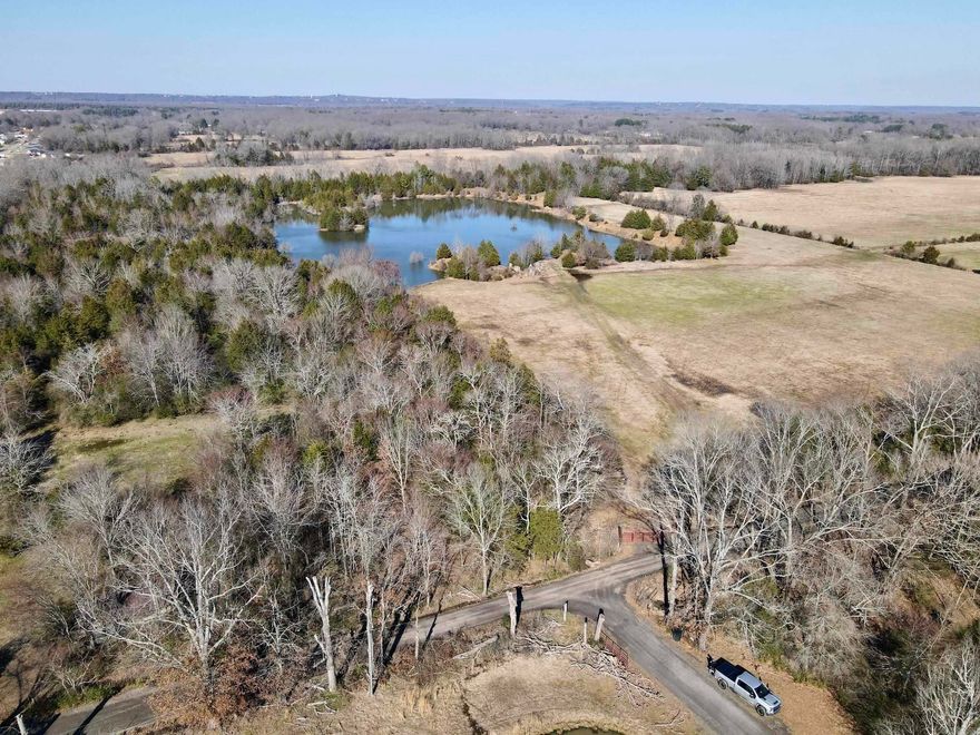 For the first time in generations, this beloved family farm is available, offering a rare opportunity to own a piece of local history. Perfectly located just 5 minutes from everything, the property features a fenced pasture currently used for running cattle, making it ideal for agricultural use or future development. A highlight of the property is the 7-acre lake, complete with a boat ramp, providing easy access for fishing, boating, and enjoying the abundant waterfowl. With county road frontage and several potential building sites, the possibilities are endless—whether you're envisioning a private retreat, a working farm, or a development project. Additional land is available, offering even more flexibility for expansion or investment. Don't miss this unique opportunity to own a historic farm with modern conveniences and boundless potential. Schedule your private showing today!