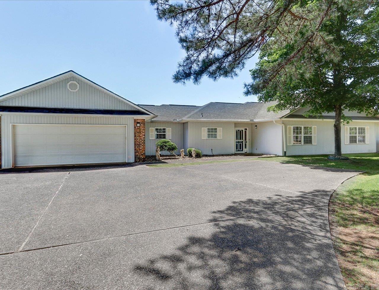 This home features a stunning Premier Diamondhead Golf Course lot and beautiful custom home! Nestled in a cul-de-sac on .34 acres, this property boasts breathtaking 180-degree views of both the fairway and pond. This home features an open floor plan that seamlessly connects the Great Room, dining area, and kitchen. A hallway leads to a private Master Suite with picturesque golf-course vistas and private area. Oversized Laundry room, half-bath and garage with a golf-cart overhead door for driving right into the garage. Extra cabinetry for a workshop. Spend your days watching golfers and unwind in the serene ambiance of the golf-course and lake views from the screened-in Sun Room. Enjoy al-fresco dining in this space or step outside onto the patio. This immaculate home is a must-see and move-in ready!This is an estate sale and has to be approved by the court.