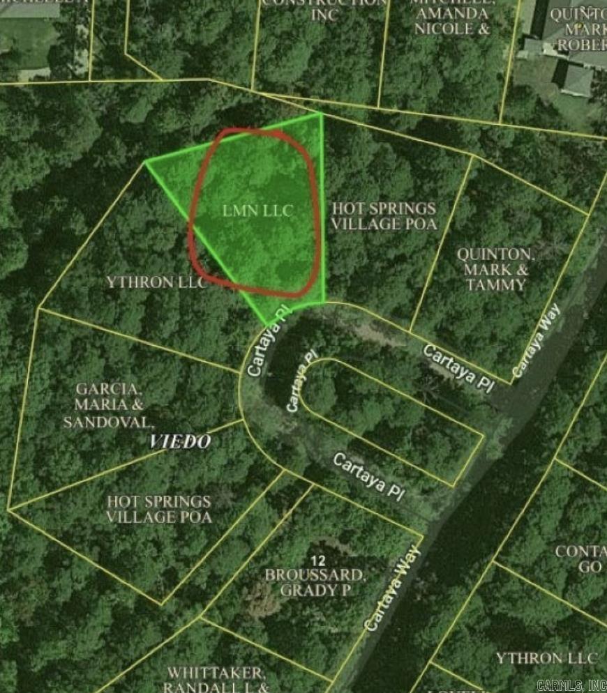 Land for sale in a beautiful gated area in Hot Springs Village.