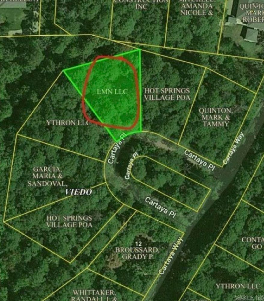 Land for sale in a beautiful gated area in Hot Springs Village.