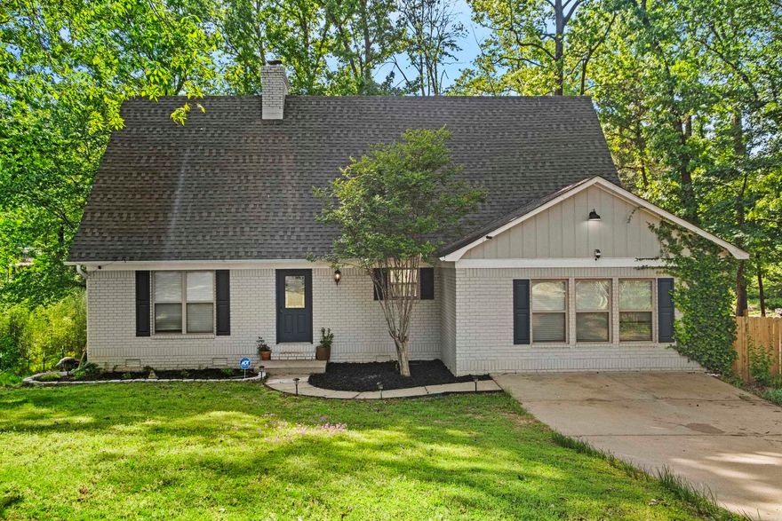 This charming 3-bedroom, 2-bath home is ideally located just a short 10-minute drive from Little Rock Air Force Base, offering both convenience and a peaceful setting. Remodeled in 2020, the home features modern upgrades throughout while maintaining a warm, inviting feel. The family room is the heart of the home, showcasing a stunning floor-to-vaulted-ceiling fireplace—perfect for cozy evenings or entertaining guests. Overlooking the family room, the loft provides a versatile space ideal for a home office, reading nook, or play area. Step outside to the covered deck, a perfect spot for relaxing or hosting gatherings while enjoying the natural surroundings. Major updates include a new roof and HVAC system, both replaced in 2022, providing added peace of mind.