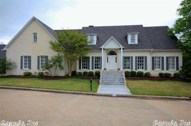 Elegant one level brick home on beautifully landscaped lot in private neighborhood. Handsome hardwood floors, tall ceilings and spacious rooms. A wonderful floor plan with the updated Primary Suite apart from two guest bedrooms with shared bath and Office. Upstairs with large 4th bedroom/bonus, full bath, storage & attic access. Updated Kitchen is open to breakfast area & Den with access to covered back porch. Zoned HVAC-3 units. Rear loading 2 car garage with enclosed breezeway to house. Come See!