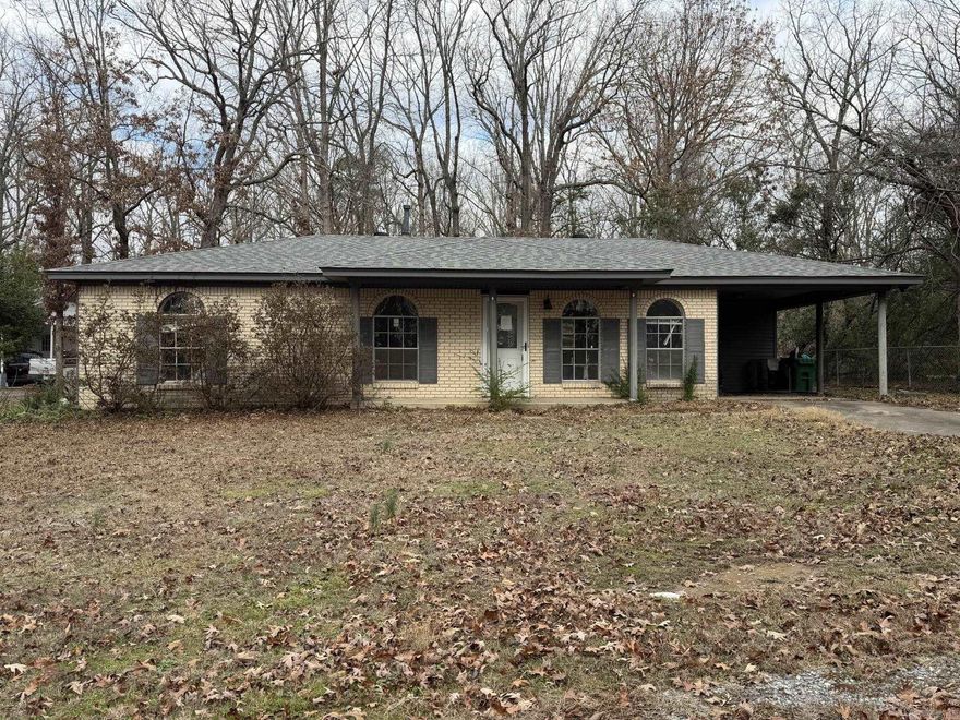 This home offers a functional and easy-flow layout designed for everyday living. From the front door, you enter directly into the living room, which leads straight into the kitchen and dining area. From the kitchen, there is convenient access to the laundry room, carport, and backyard, creating a practical connection between indoor and outdoor spaces. To the left of the entry, a hallway leads to two additional bedrooms, a guest bathroom, and a primary suite that includes a private half bath. The floor plan provides comfortable separation of living and sleeping areas while maintaining an efficient use of space. Conveniently located with access to local amenities and major routes. This property is a short sale, and all terms are subject to lender approval. Buyers are encouraged to verify all information and conduct any inspections they deem necessary. Seller in the process of clearing out personal property. Please be mindful during showings. More pictures to come post clean up.