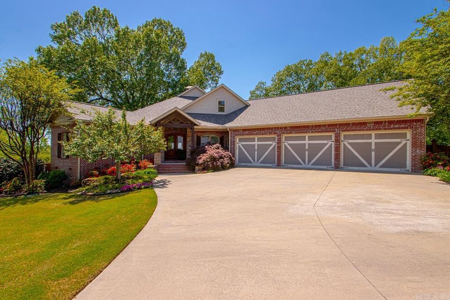Welcome Home! 1 acre less than a mile to I-30 and less than 1.5 miles to the Downtown Benton Square! Not included in square footage is the office/bonus room above the garage. 600sqft extra! No need to go to Garvan Woodland Gardens when you have it in your yard! The landscape with this home deserves a tour of its own. Complete with carefully placed stones along with a waterfall, you'll never need a getaway again! Inside the home features 3 bedrooms. All bedrooms are complete with their own bathroom featuring walk in tile showers. The primary bedroom has a private entrance to the back yard oasis. The primary bath features heated floors! The entry way of the home opens up to a large, bright dining room, open living-kitchen. The kitchen features double wall ovens and a gas surface range. Ice maker! When you don't want to cook inside, don't forget about your complete outdoor kitchen with commercial vent-a-hood. Down the hall from the kitchen you will find the half bath leading to the massive 3 car garage complete with a safe room. Above the garage is the 600sqft bonus/office. Above ground pool done right with the full enclosed deck. New Roof in 2025. You need to see this one in person!