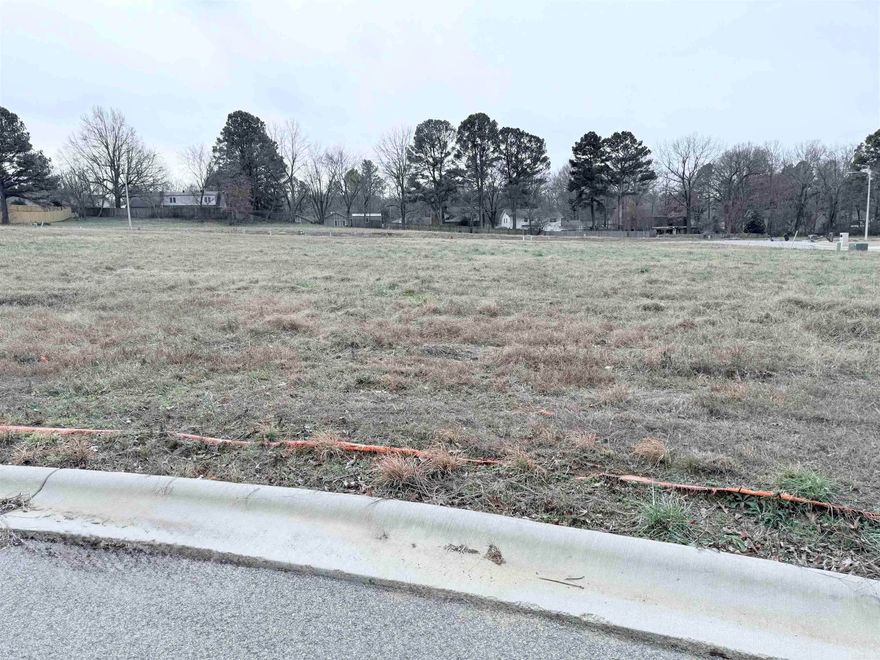 Large level residential lot in cul-de-sac of Creekwood Addition ready for building.