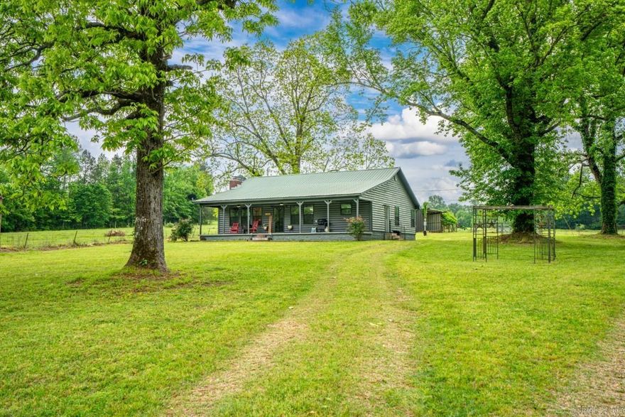 ABSOLUTE HOME and LAND AUCTION Saturday, June 1st at 11AM   ** We will be selling in 4 Tracts and it's entirety ** 1270 Hempstead 31 Nashville, AR 71852 Live Onsite Auction with Online PRE - BIDDING Pre Auction Offers are Welcome!! 1,440+/- SF Home Built in 2006 and is Situated on 40+/- Acres - All Electric, Septic System, City Water and 36" Doorways.  This Home Offers an Eat-in Kitchen Open to the Living Room with Vaulted  Ceilings, Large Master Bedroom with En-Suite Bathroom with Jacuzzi Tub/Shower Combo, Sun Room, Tile Flooring, Log Siding Exterior,  Metal Roof, Several Large Shad Trees, Partially Fenced  with a Small Barn.