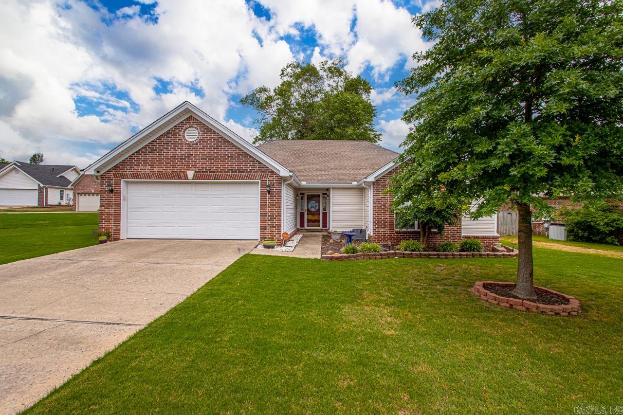 VERY - Well maintained, clean, 3 bedroom, 2 bath home in a culdesac in Heritage Farm! This home has LVP & fresh paint throughout. Kitchen has granite countertops, plenty of counter space, & breakfast bar. Living room is large with a tray ceiling & gas log fireplace. The guest bedrooms are large with LVP flooring & large walk-in closets with built-ins! Primary bedroom tray ceiling and opens to the Primary bath. Primary bath has walk-in shower, jetted tub, & large walk-in closet with shelving! The backyard is very large! There is a nice deck for entertaining. There is also a large storage building with ELECTRICITY! New Hot Water Heater in 2023! Heritage Farm Subdivision amenities include a huge zero-entry swimming pool (great for all ages), a playground area, picnic tables, a community room, and sidewalks and wide streets throughout the neighborhood! You're sure to meet great neighbors and make new friends here!