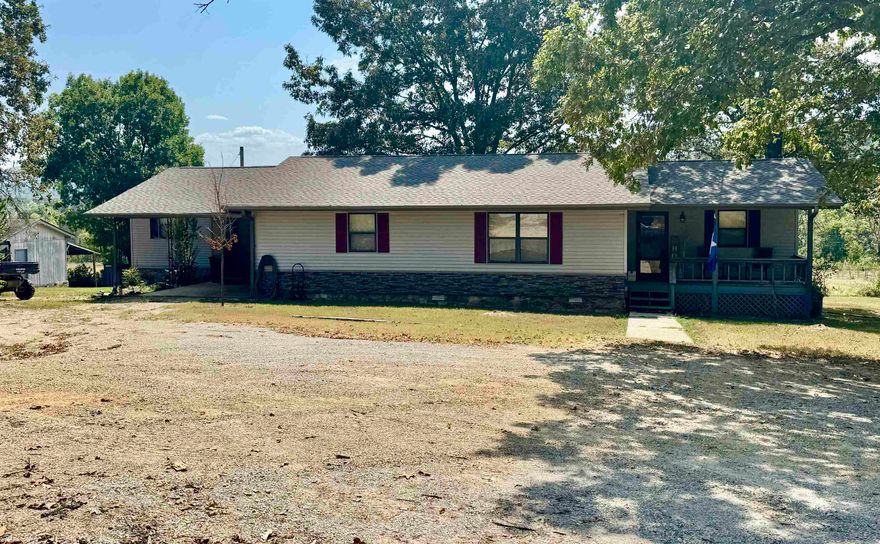 COUNTRY HOME on 7.5 ACRES WITH A VIEW! This 3 bedroom, 2 bath home has been recently remodeled! This home features a large living area, open kitchen/dining area, and a master suite with a walk in closet and full bathroom! Downstairs is a fantastic game room with a built in bar and kegerator that will convey! There is a 1 vehicle carport, large back deck, storage building, and a 12x32 workshop with electric ran! This property would be great for a Hobby Farm!  New Roof installed in 2024! Located close to Piney Creek & the White River as well as Downtown Calico Rock! Additional 10 acres can be purchased