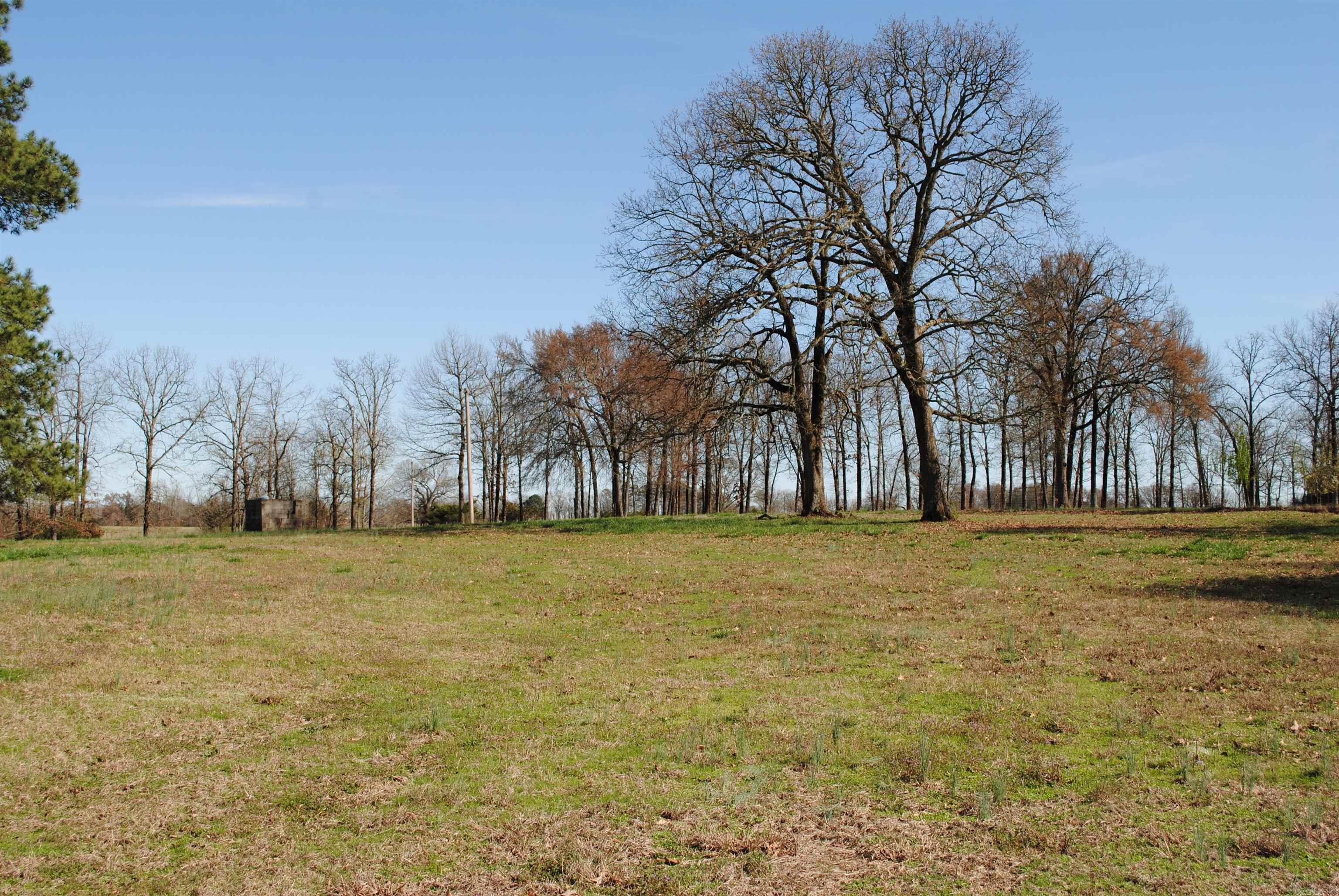 Sold before listed. Property is behind a 2.5 ac. parcel. Property includes an open hay barn and two small storage buildings.