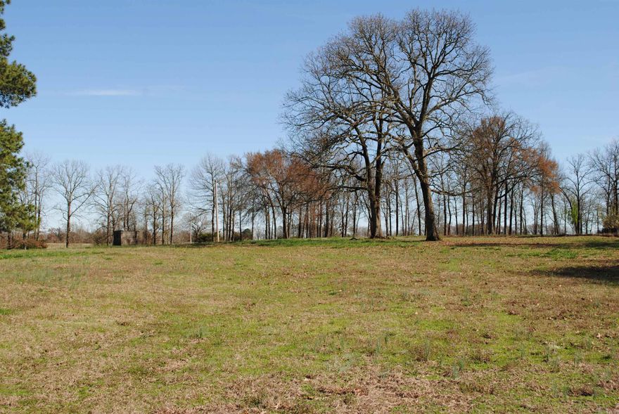 Sold before listed.  Property is behind a 2.5 ac. parcel.  Property includes an open hay barn and two small storage buildings.