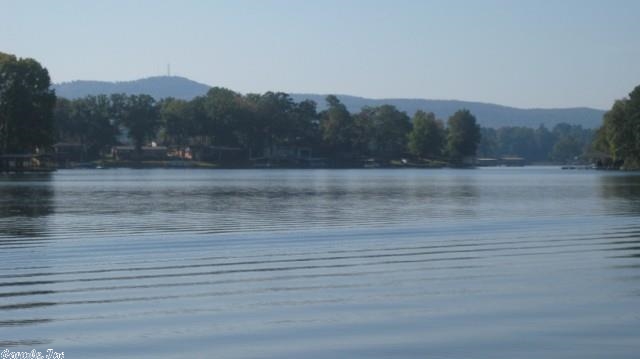 THE BEST FOR LAST.... This may well be the best Lake Hamilton waterfront lot left...350+ feet level Lake Hamilton waterfront...Several Lots have sold for $4,000 per front foot on Lake Hamilton but few have this to offer: Double Boat Dock (with the possibility of adding a second double dock)...BREATH-TAKING VIEWS OF LAKE & MOUNTAINS...Over 2 Acres-Possible Subdividing into two or more lots...Boardwalk...Seawall...All city utilities...Inside the city - no bridges to cross...SEE AGENT REMARKS