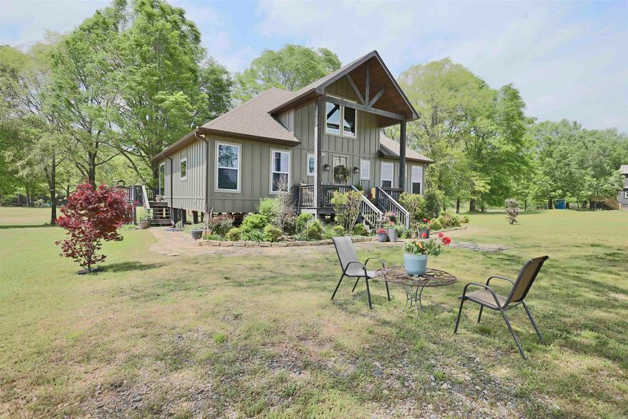 Tucked away in the secluded Rocky River Estates, this cozy cabin offers the perfect blend of privacy, tranquility, and natural beauty, with approximately 100 feet of private gravel bar frontage on the Caddo River. Adventure and relaxation await just outside your back door. Whether you’re looking for a weekend getaway, a company retreat, or a full-time home, this cabin delivers a unique lifestyle that’s hard to find.  Inside, the cabin features an open floor plan, a massive rock fireplace, large picture windows, and a lofted living space, providing comfort, warmth, and breathtaking views from every room. The craftsmanship is exceptional, with thoughtful details you truly have to see to appreciate.  Surrounded by river and mountain views in every direction, this property is located in the foothills of the Ouachita Mountains—just five minutes from Glenwood, 10 minutes from the Glenwood Country Club and Golf Course, and only 45 minutes from Hot Springs. You’re also within reach of numerous lakes, rivers, and outdoor recreation. Don’t miss your chance to own a slice of paradise on the Caddo River.