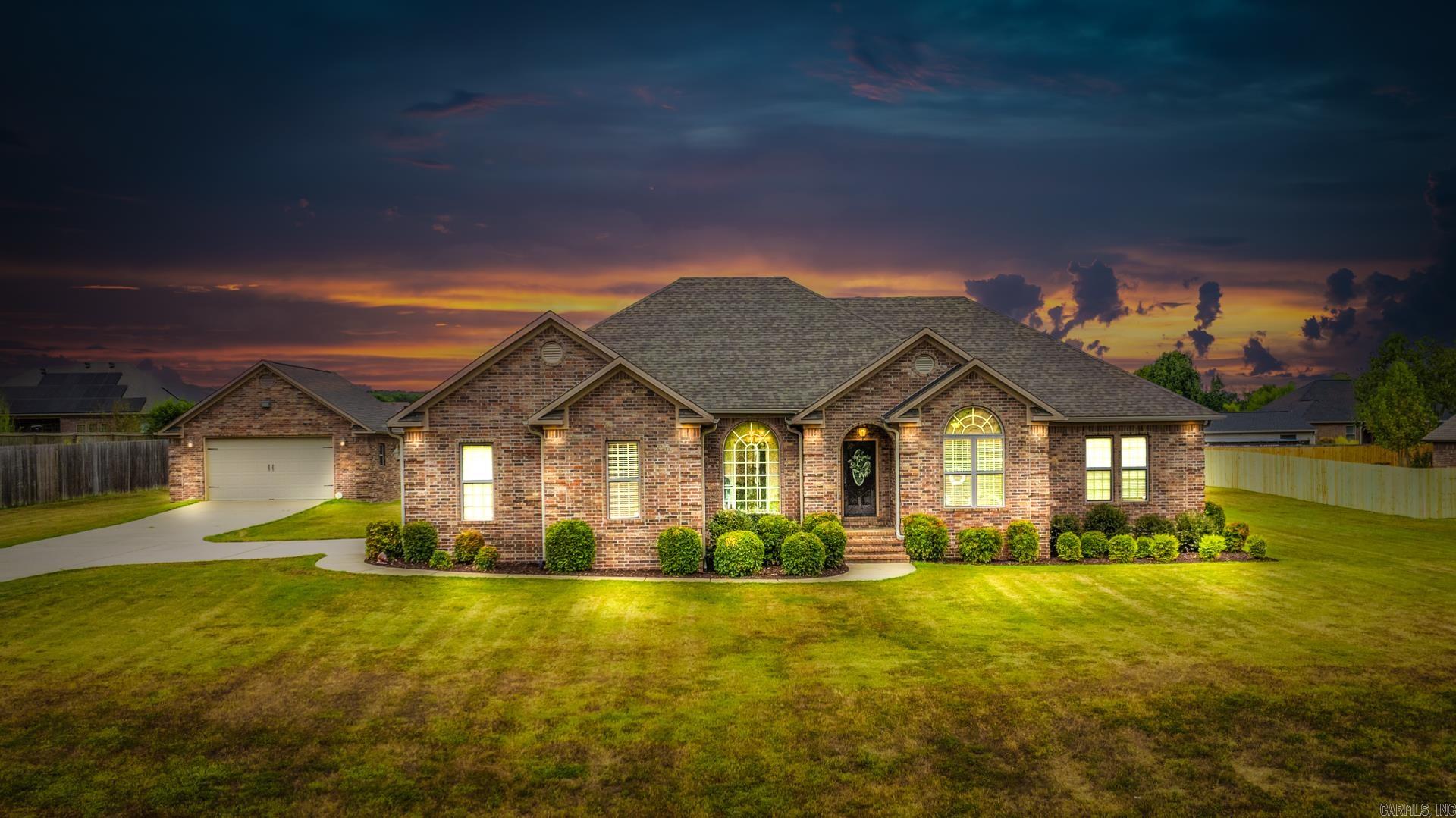 Beautiful well maintained home on almost an acre in an established neighborhood close to schools and shopping. This home features 4 Bedrooms and 2 1/2 bath with a very nice shop.