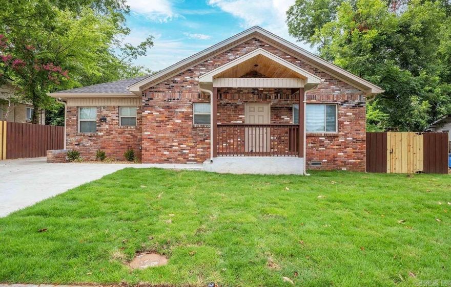 Thoughtful remodeled home with today's buyer in mind.  Blends modern finishes with the character and charm of the old. Modern kitchen with quartz counters, pretty white cabinets and stainless appliances. Nice primary suite: bath with big soaker tub and separate shower. 2nd bedroom has its own bath. Cozy dining area with fireplace. Large family room that's great for gatherings or it could be a 3rd bedroom. Home sits directly across from North Little Rock High School so kids can walk to school. Great location that's convenient to public transportation, interstate, shopping and dining. Surrounded by many updated homes and some new construction. See it for yourself.  Seller is ready to move it.