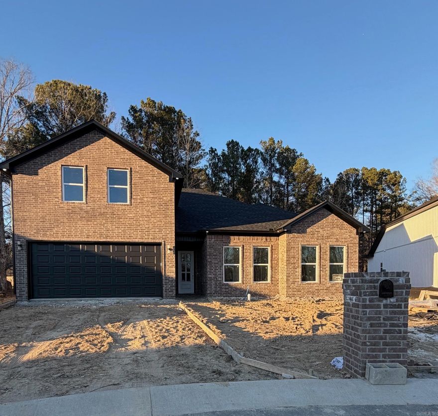 Under-construction one-story home in the welcoming Agua Blanca subdivision. This 4-bedroom, 3-bath home features a classic brick exterior, open-flowing layout, eat-in kitchen with breakfast bar, durable vinyl flooring, and thoughtfully selected finishes. Enjoy a level yard with covered back patio, two-car garage, central heat and air, and public utilities. Conveniently located near the Outlets of Little Rock with quick access to shopping, dining, and everyday amenities.