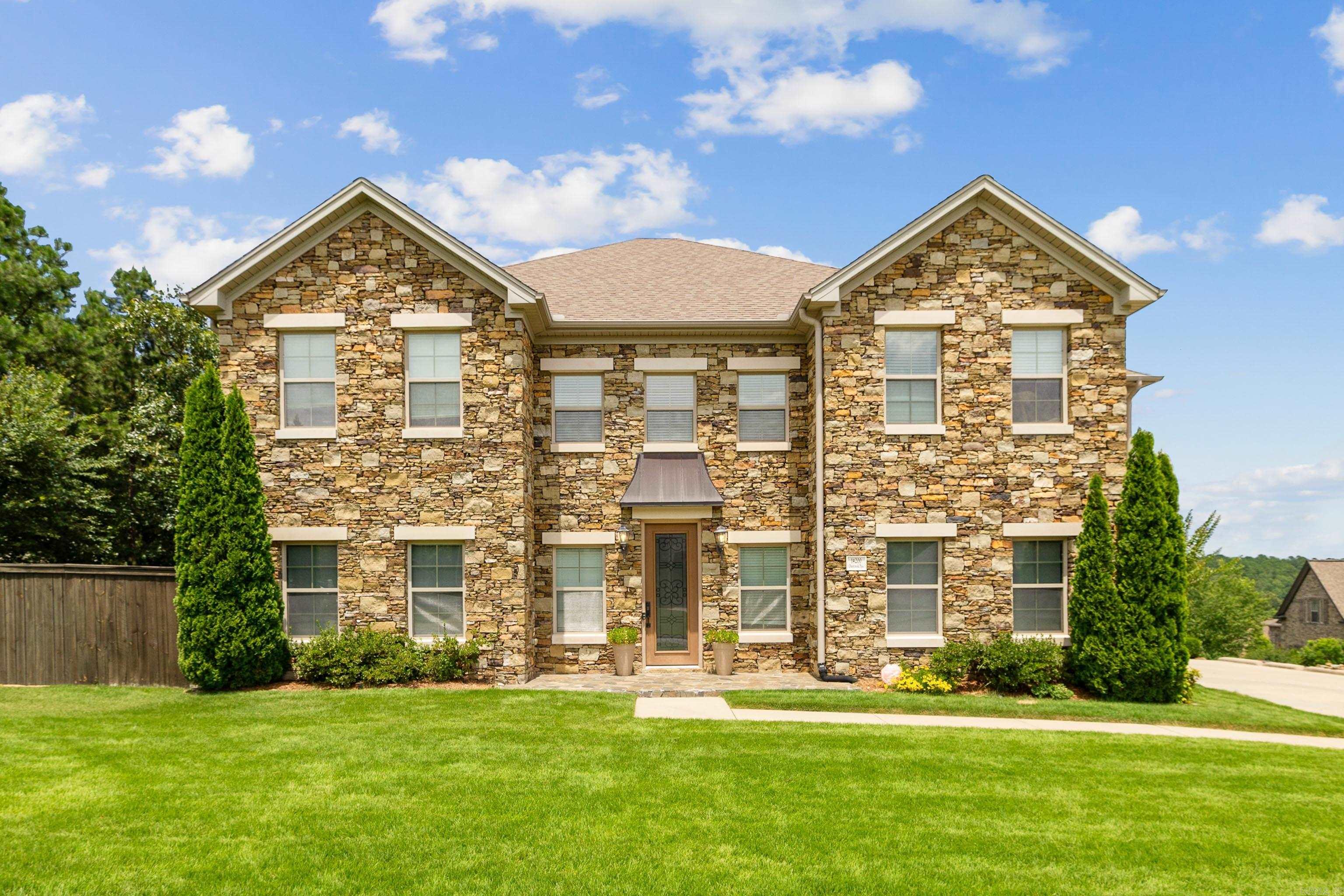 Welcome to this beautifully maintained 4-bedroom, 3.5-bath, 2-story home in the highly sought-after Woodlands Edge community of Little Rock, AR. This spacious residence features an open-concept layout with hardwood and tile floors, a dry bar, breakfast bar, eat-in kitchen. Flexible spaces include a formal dining room (or family room/playroom area), home office, and bonus room. The primary suite offers a gas fireplace and access to a private screened, covered patio, while the main living room also includes a gas fireplace and opens to a second covered patio and fully fenced backyardāperfect for pets, play, or entertaining. The front yard is beautifully landscaped, with a sprinkler system enhancing curb appeal. Residents enjoy access to premium neighborhood amenities including a pool, tennis courts, playground, walking and biking trails, and picnic areas. This home blends comfort, function, and community livingāschedule your tour today!