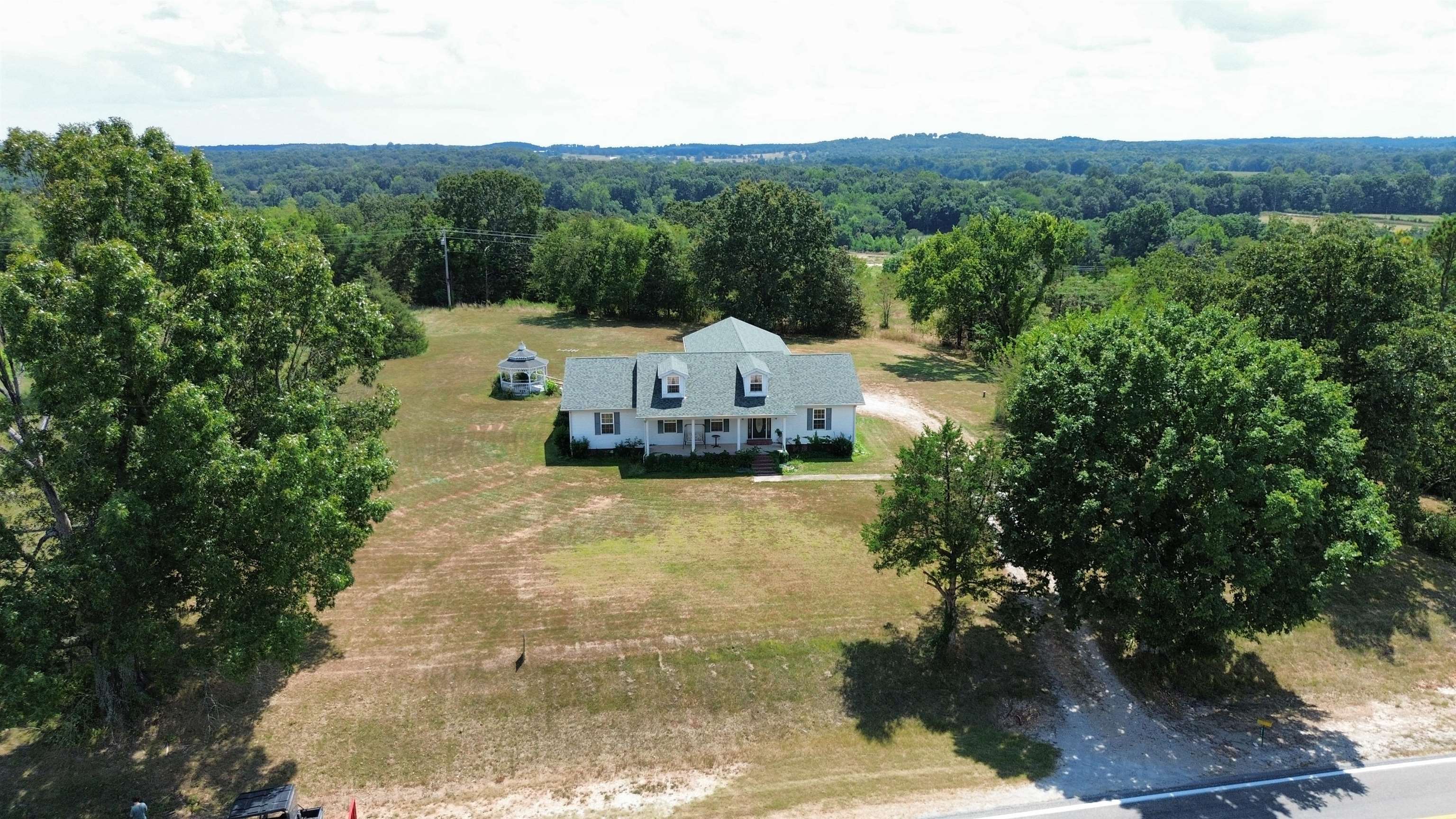 Experience peaceful country living on this beautifully maintained 2-acre+/- property along Hwy 354. This 3-bed, 2-bath home offers nearly 2,000 sq ft with wide hallways, large door frames, and full handicap accessibility, perfect for retirement or anyone seeking comfort and ease. Cozy up by the gas fireplace, park under the spacious covered carport, and enjoy the 960sqft garage heated, cooled, and complete with a fully floored attic. A storm shelter adds peace of mind. Just a short drive to Horseshoe Bend and the Box Hound Marina beach on Crown Lake, youāll have easy access to boating, fishing, swimming, and lakefront relaxation. This is more than a home, itās a country lifestyle designed for freedom, function, and charm!