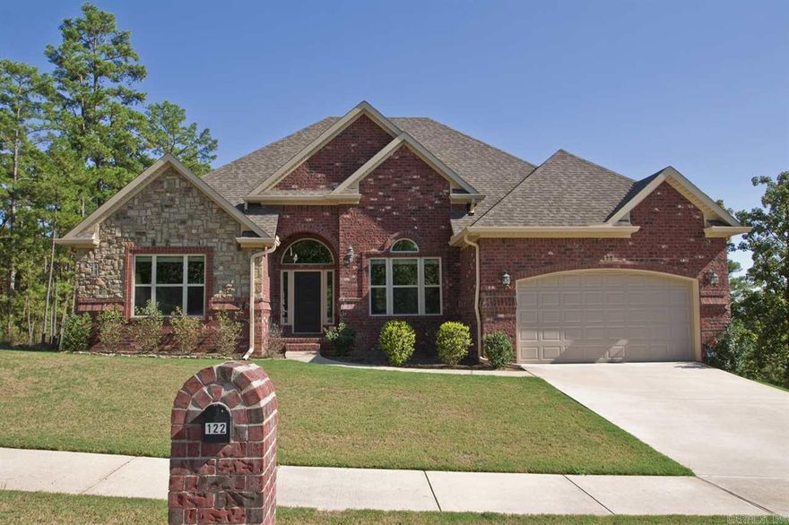 Charming 4 bedroom home w/beautiful street appeal.  Located at the end of a cul-de-sac and offering fabulous views this one level home is an entertainers dream with open floor plan, 1000 sq. ft. sun deck space, beautiful moldings, tray ceilings, tall ceilings and hardwoods.  Split bedroom plan with private master suite w/2 sink vanities, whirlpool tub, sep. shower and walk-in closet.  Other features include underhouse storage, surround sound, wood blinds, security system, gutters and exterior up lighting..