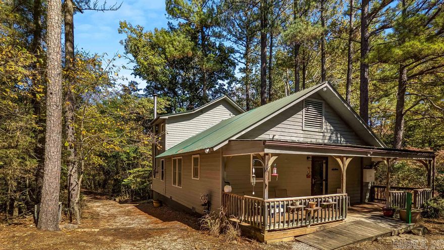 Well maintained,  totally private home in  nature lovers paradise   ~ with a little spring fed creek to boot. This artisanal sanctuary sits on a ten acre lot that is into the National Forest.  There are no neighbors around and plenty of breathing room.  Grounds have thoughtful hardscaping  with native landscaping beds.  There are  trails around the perimeter and one could hike into National Forest  to the network of foot and mtn biking trails that could technically lead you all the way to the Buffalo National  River from here.  There are a several outbuildings for home office, storage and wood working. (11x12 and 20x18)  Home is centrally heated and cooled but there is also a whole home attic fan.   Wood burning stove is a powerhouse!  We consider this property a jewel in the crown of Mtn View area.  Qualified buyers, pls make an appointment for a showing.  Virtual showings also offered. Offered TURNKEY for vacation rental potential.