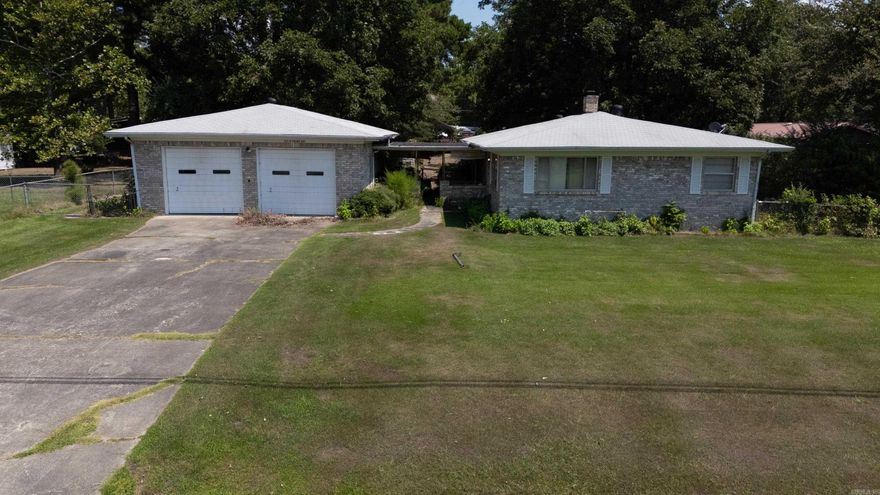 Opportunity is knocking at 604 N Grand Ave in McRae—and it won’t knock for long! This charming 2-bedroom, 2-bath home offers over 1,300 square feet of space and sits on nearly 2 acres of land with a fenced backyard and a massive 4-car garage/workshop that’s hard to find at this price point. Whether you're looking for your forever home, a smart investment, or room to grow and customize, this property delivers. This property is being sold as-is and is priced to move—homes like this are going fast.